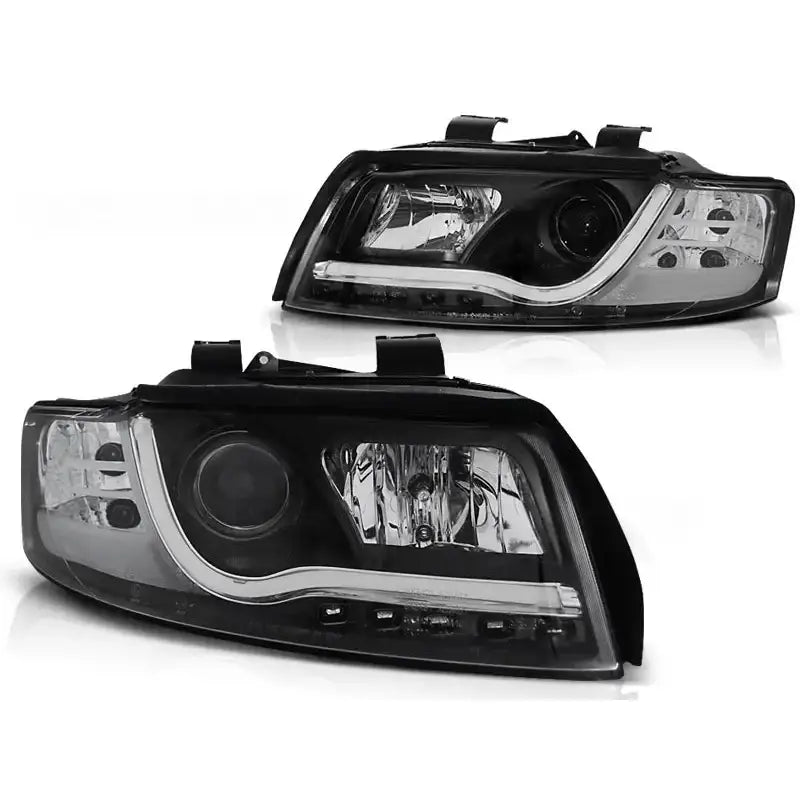 Frontlykter Audi A4 10.00-10.04 Tube Lights Black Tru Drl