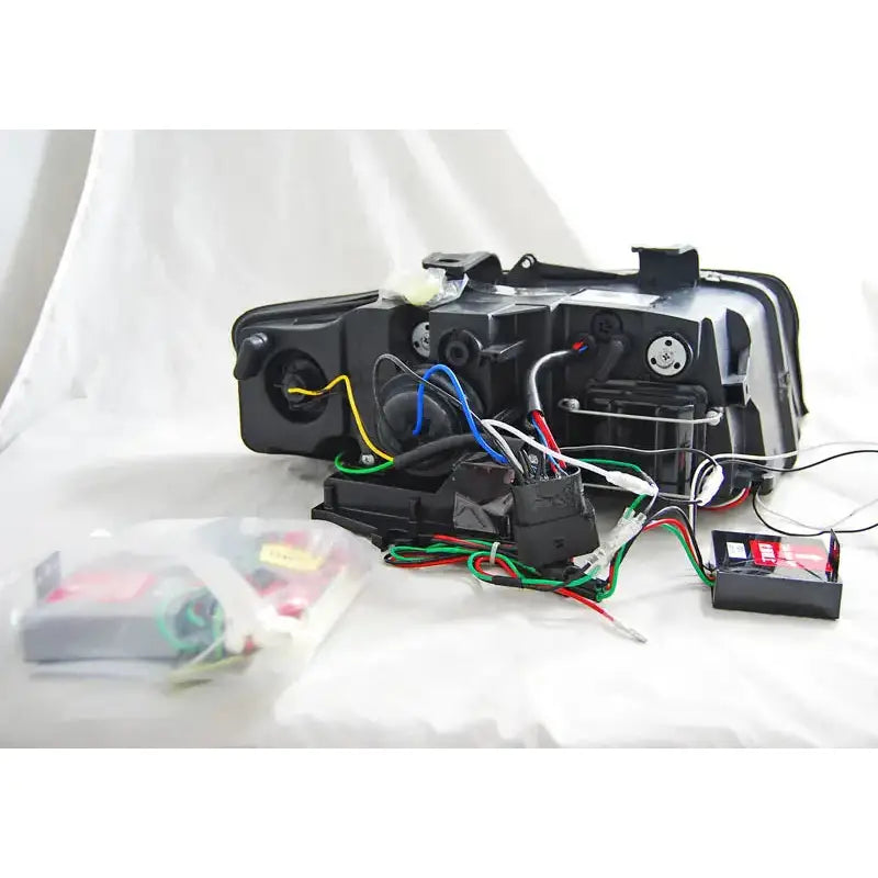 Frontlykter Audi A4 10.00-10.04 Tube Lights Black Tru Drl