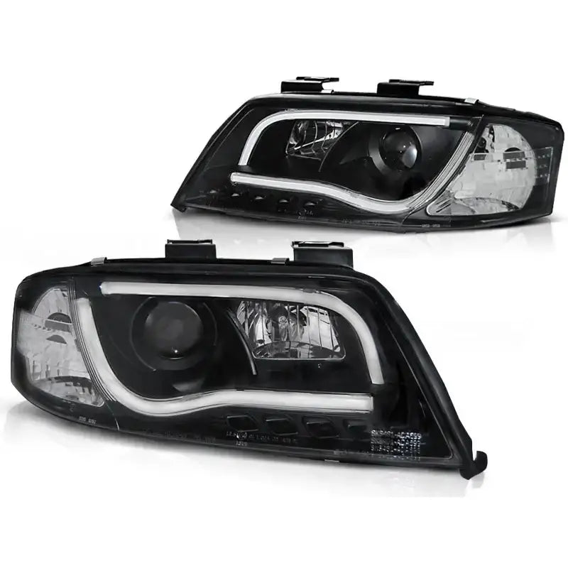Frontlykter Audi A6 06.01-05.04 Tube Lights Tru Drl Black